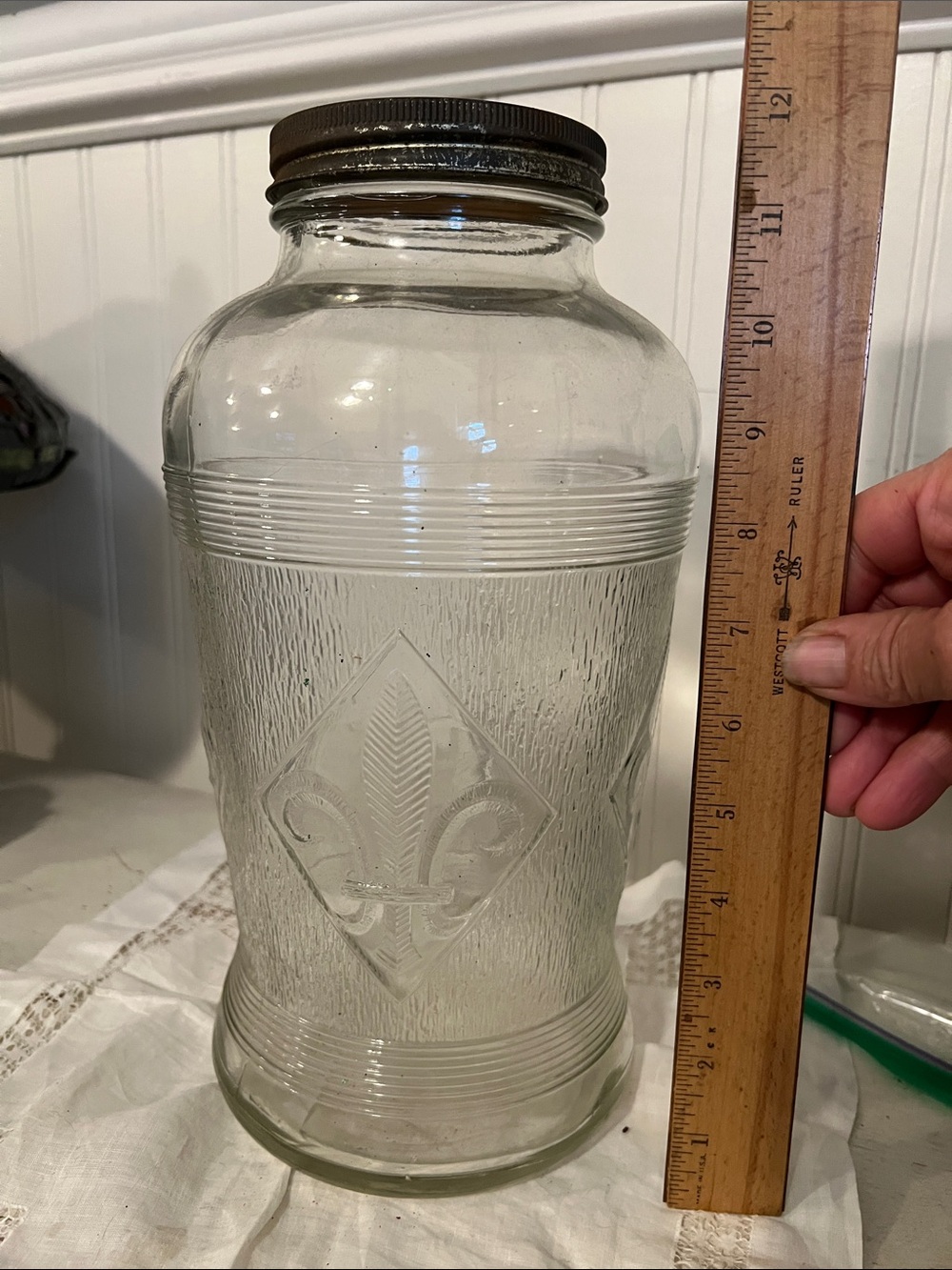 Antique Fleur de lis large ribbed glass jar 12”